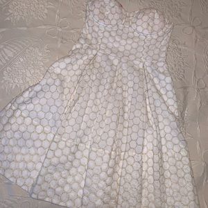 White and gold peplum dress